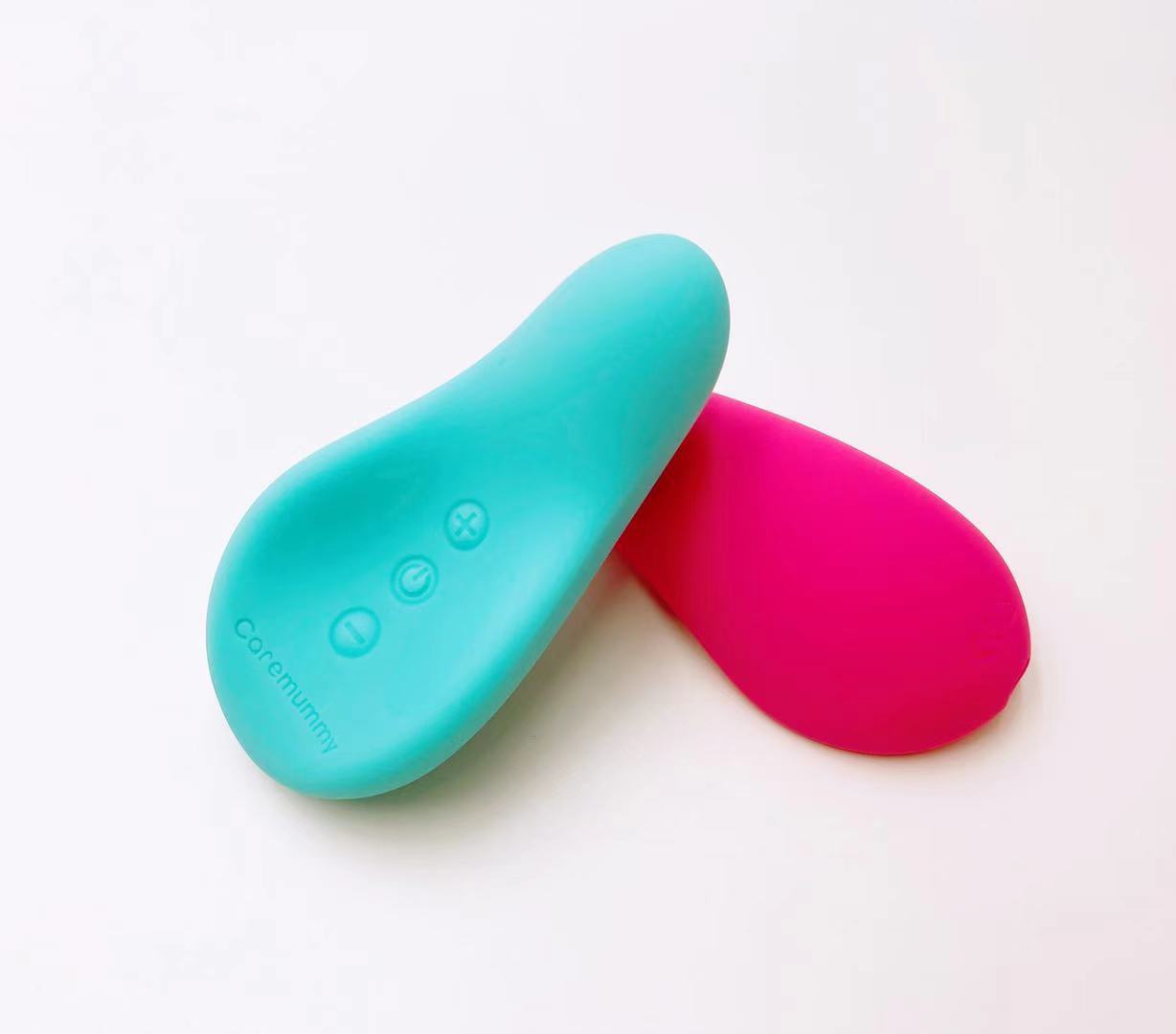 Two silicone massagers, one turquoise and one pink, on a white background.