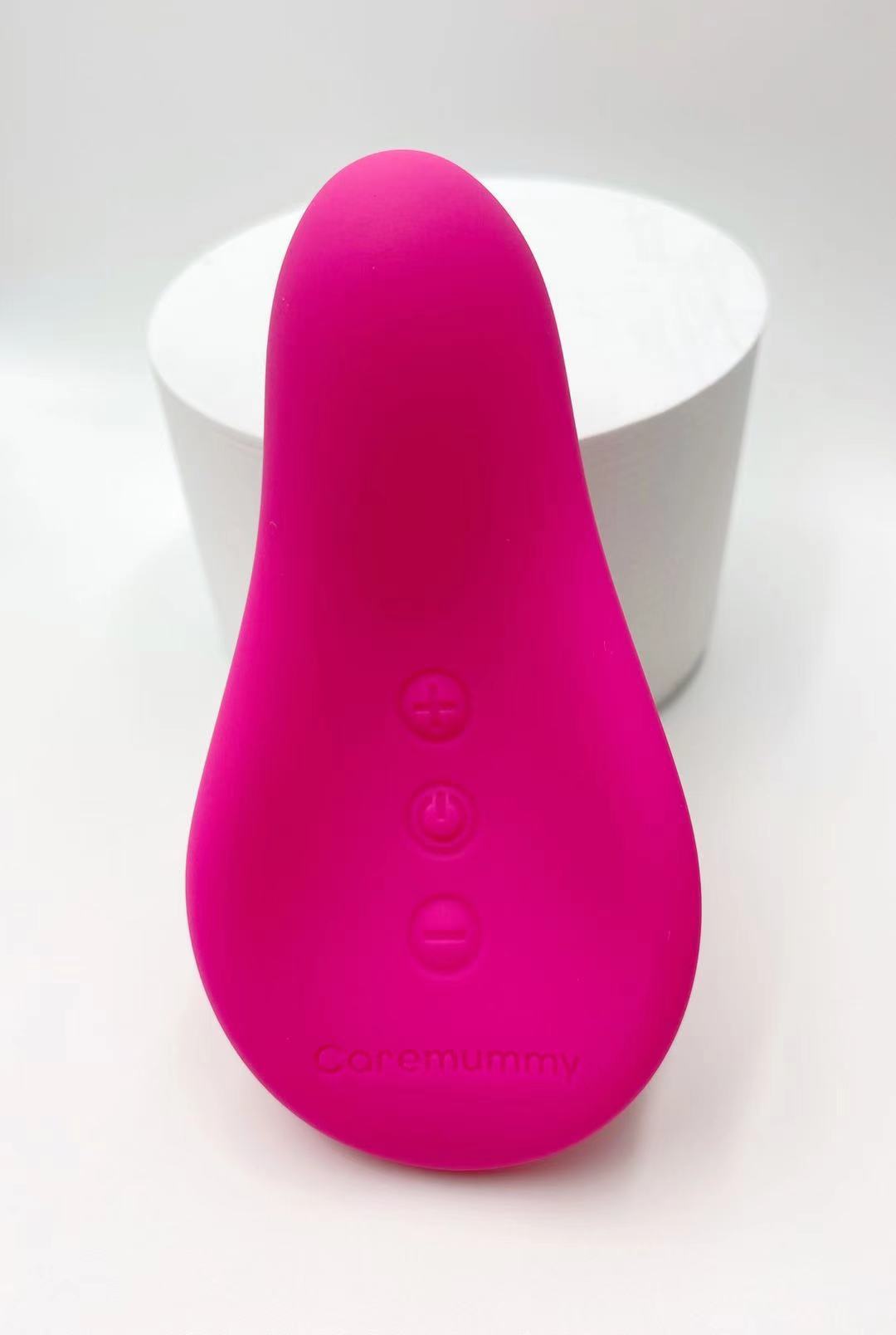 Pink electronic device with buttons on a white background