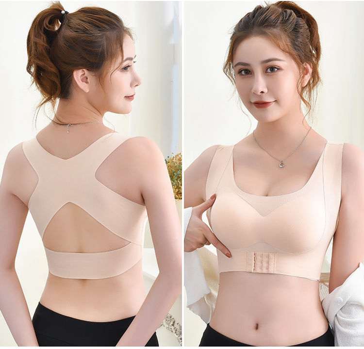 Woman wearing black posture corrector bra for breast lift and back support