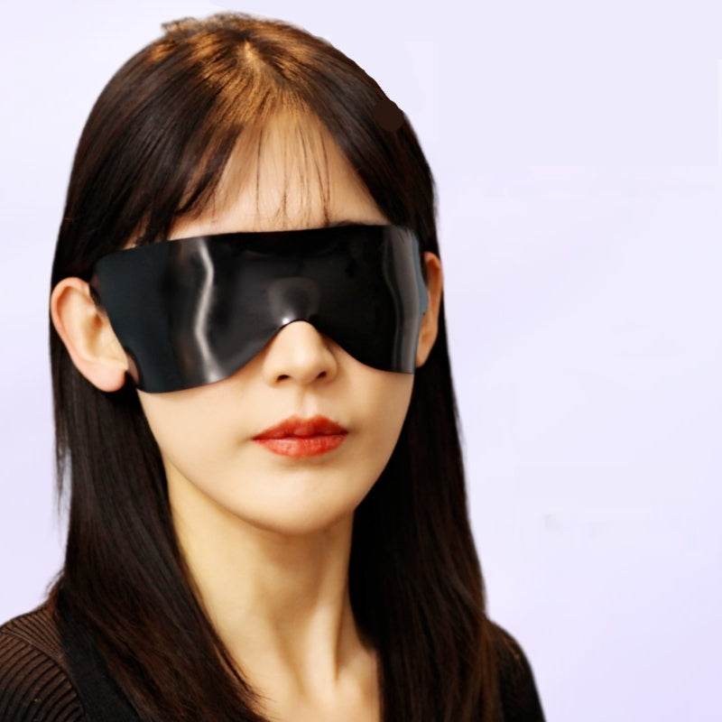 Black contoured latex eye mask with Bluetooth speakers for sleep and hands-free calls